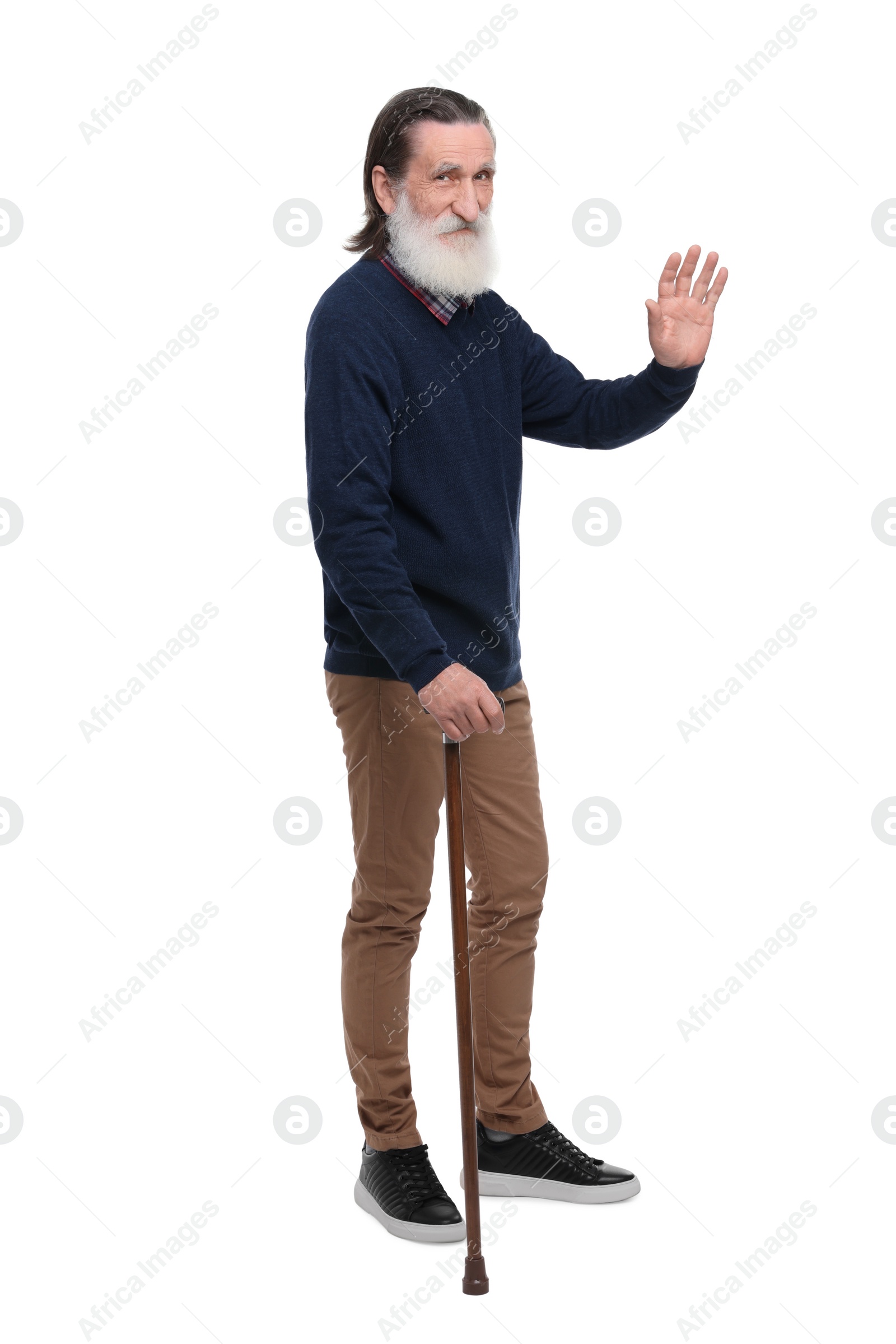 Photo of Senior man with walking cane waving on white background