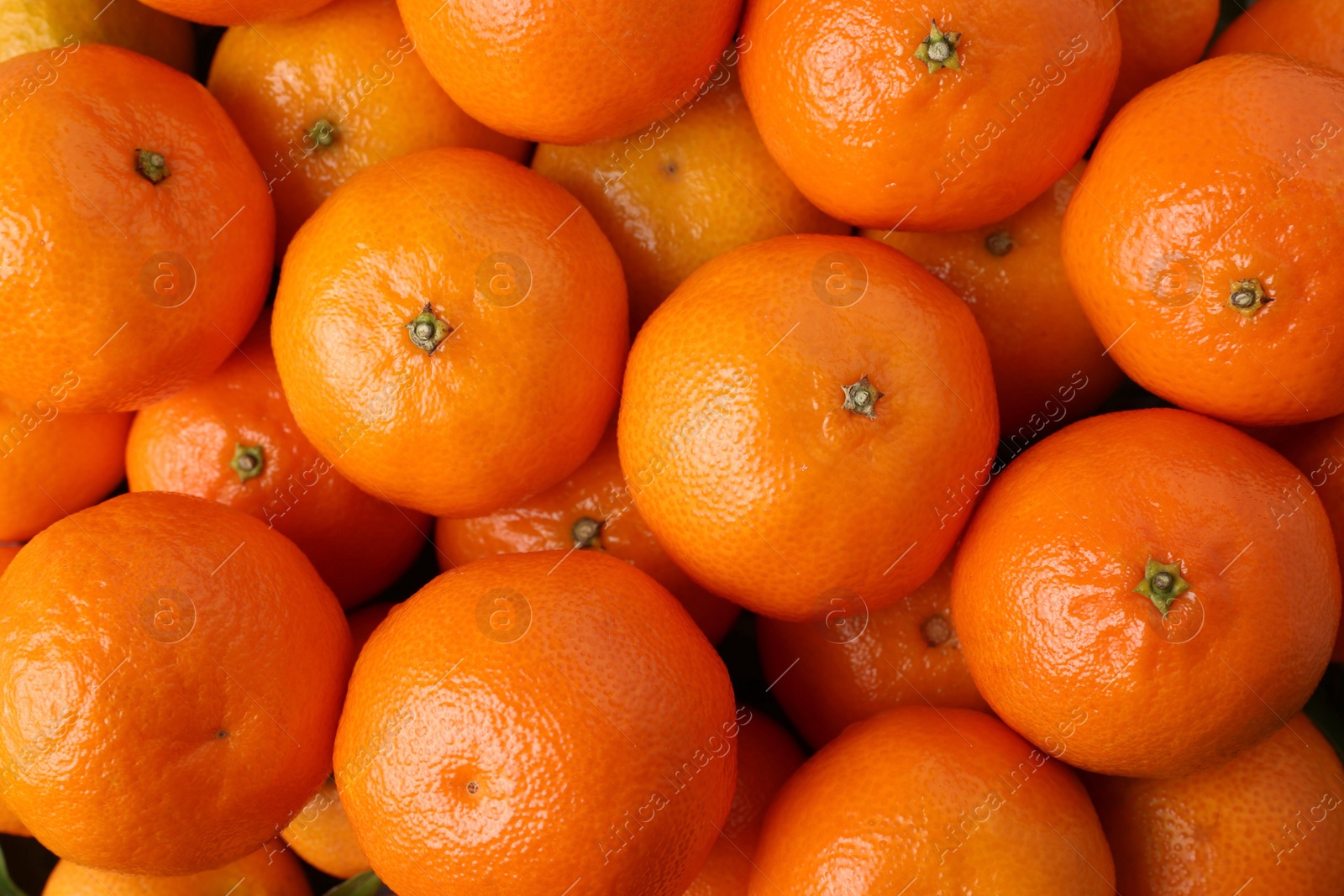 Photo of Delicious fresh tangerines as background, top view