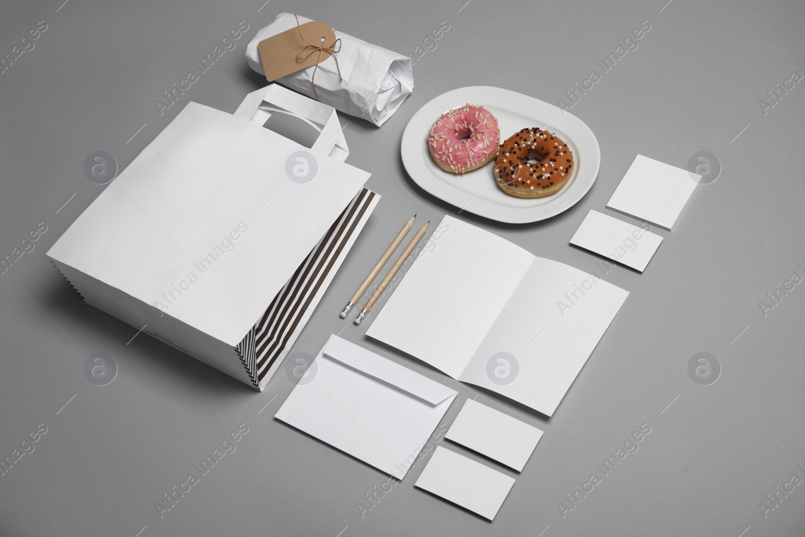 Photo of Composition with items for mock up design on gray background. Food delivery service