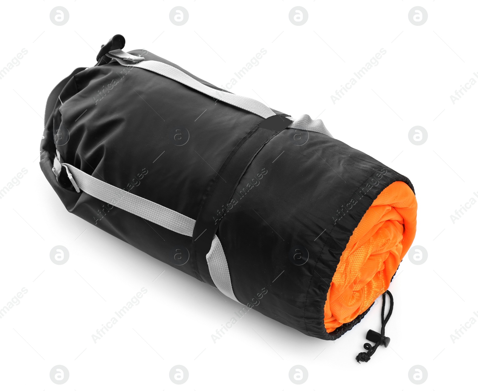 Photo of Sleeping bag in case on white background. Camping equipment