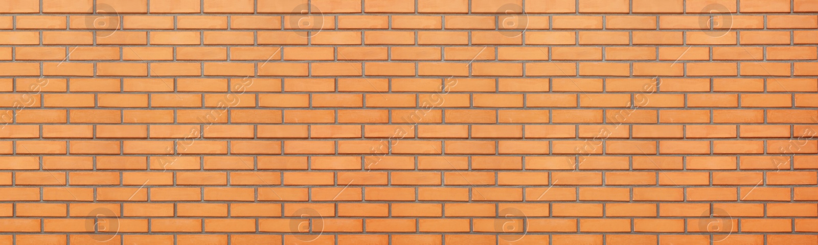 Image of Orange brick wall as background. Banner design