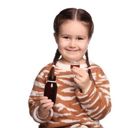 Photo of Little girl holding cough syrup on white background. Effective medicine
