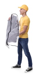 Dry-cleaning delivery. Happy courier holding garment cover with clothes on white background