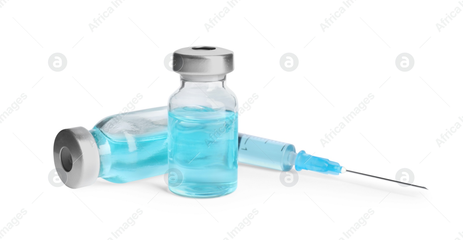 Photo of Vials and syringe on white background. Vaccination and immunization