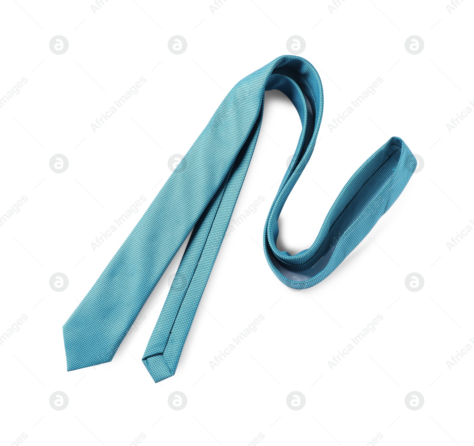 Photo of One light blue necktie isolated on white, top view