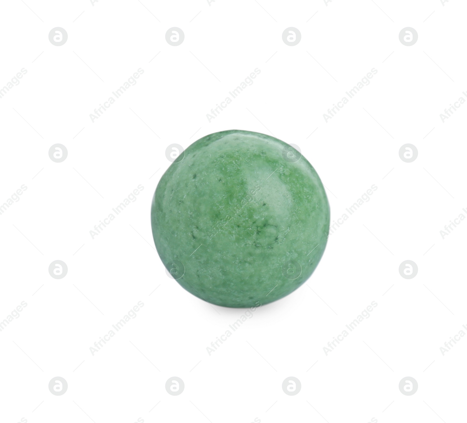 Photo of One bright green gumball isolated on white