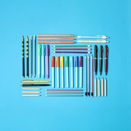 Image of Different stationery on light blue background, flat lay. Back to school