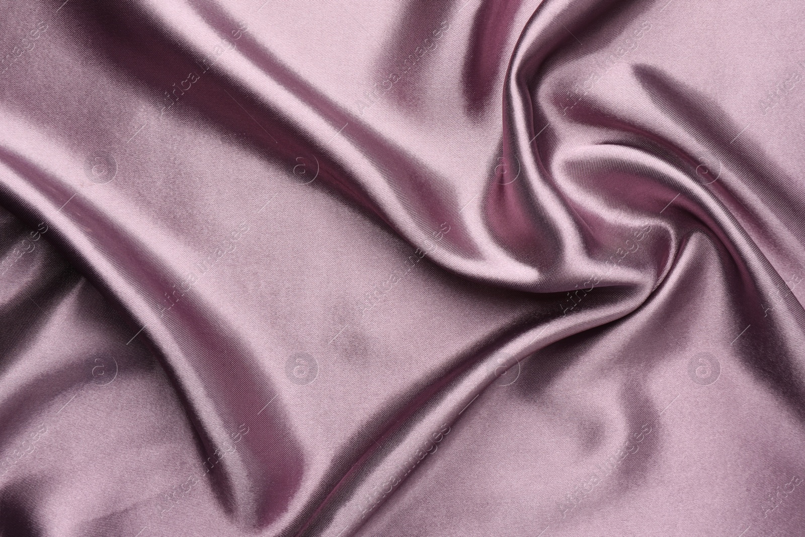 Photo of Texture of beautiful silk fabric as background, closeup