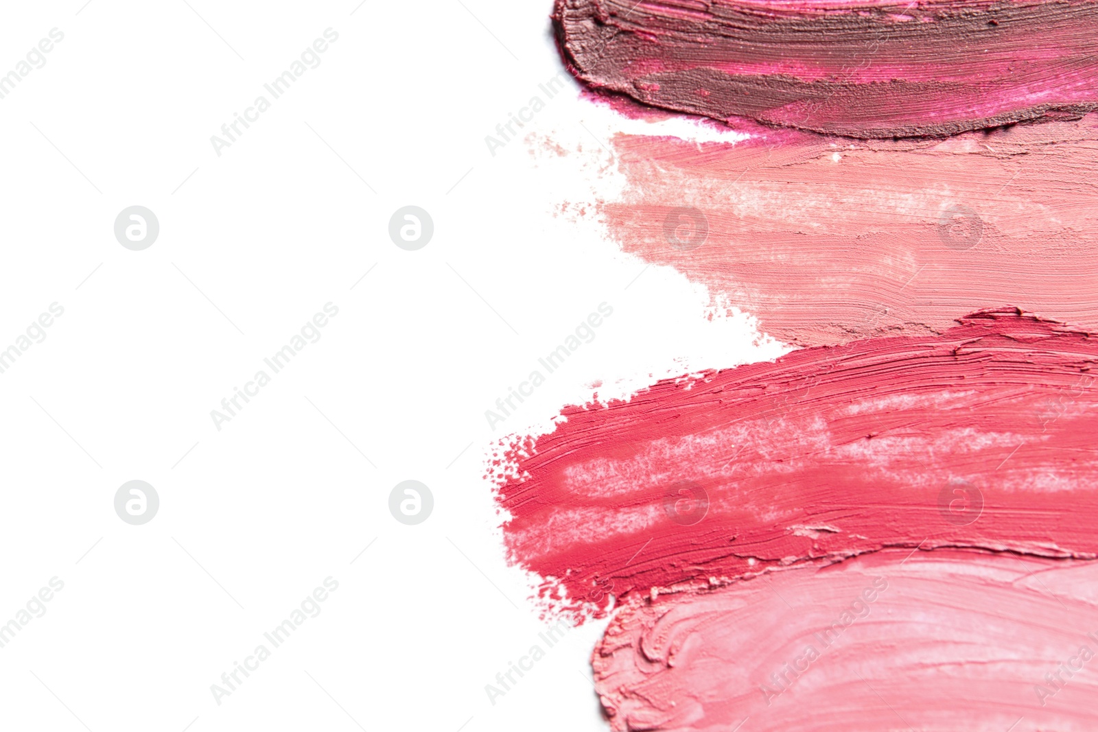 Photo of Lipstick smears isolated on white, top view. Space for text