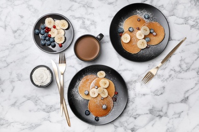 Photo of Flat lay composition with tasty pancakes on marble background