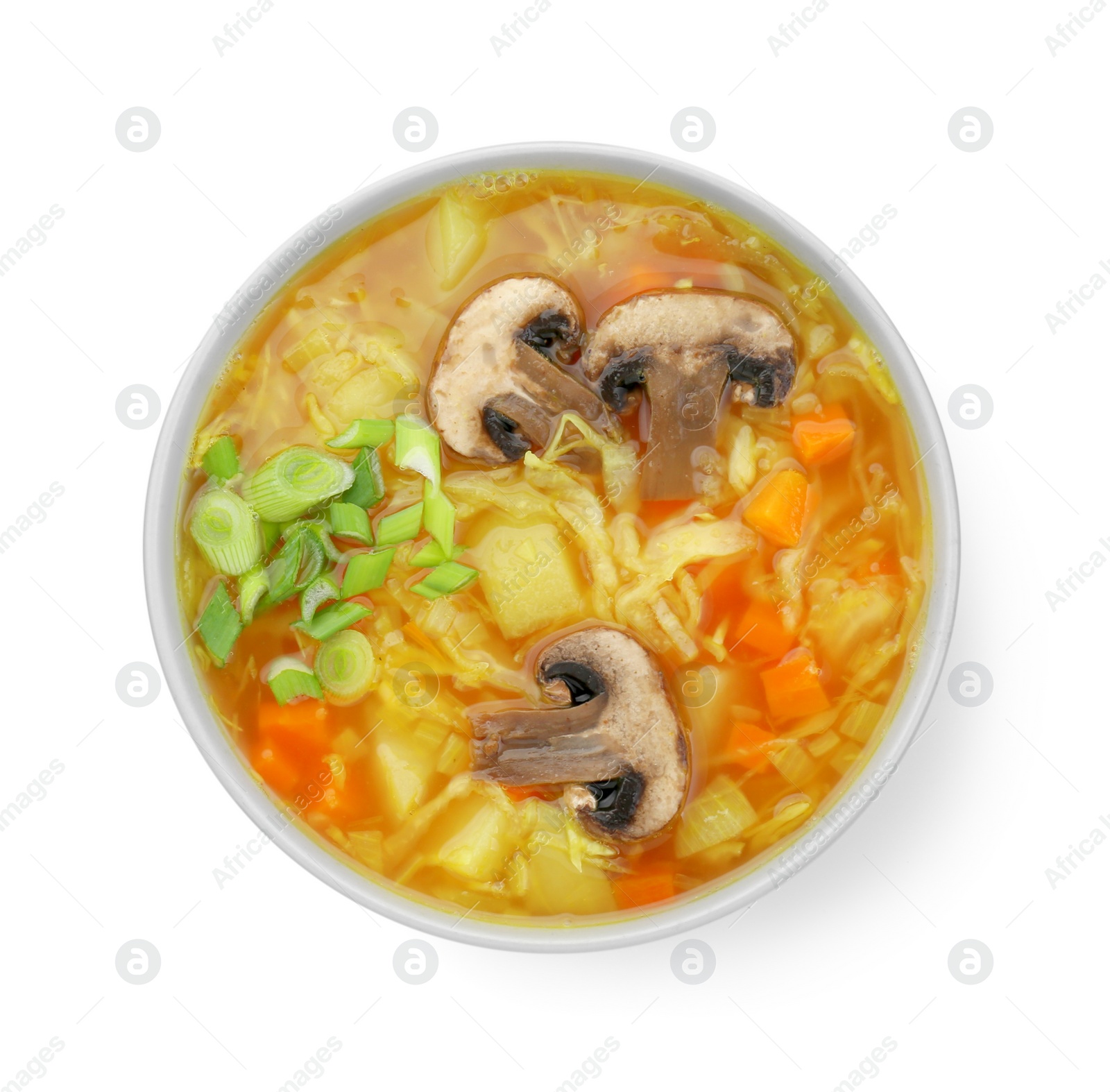Photo of Bowl of delicious sauerkraut soup with mushrooms and green onion isolated on white, top view