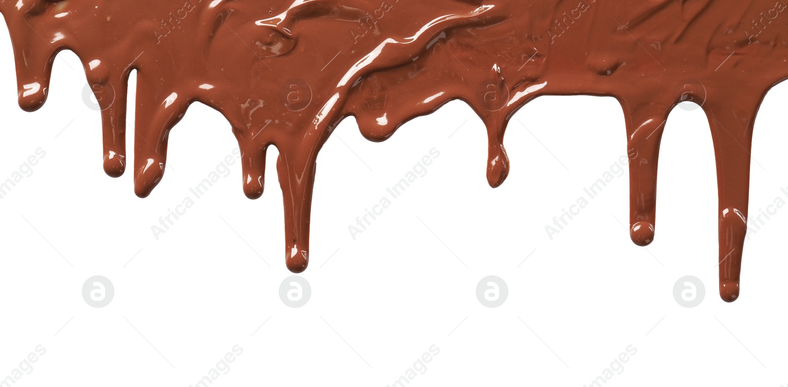 Photo of Tasty melted milk chocolate pouring down on white background