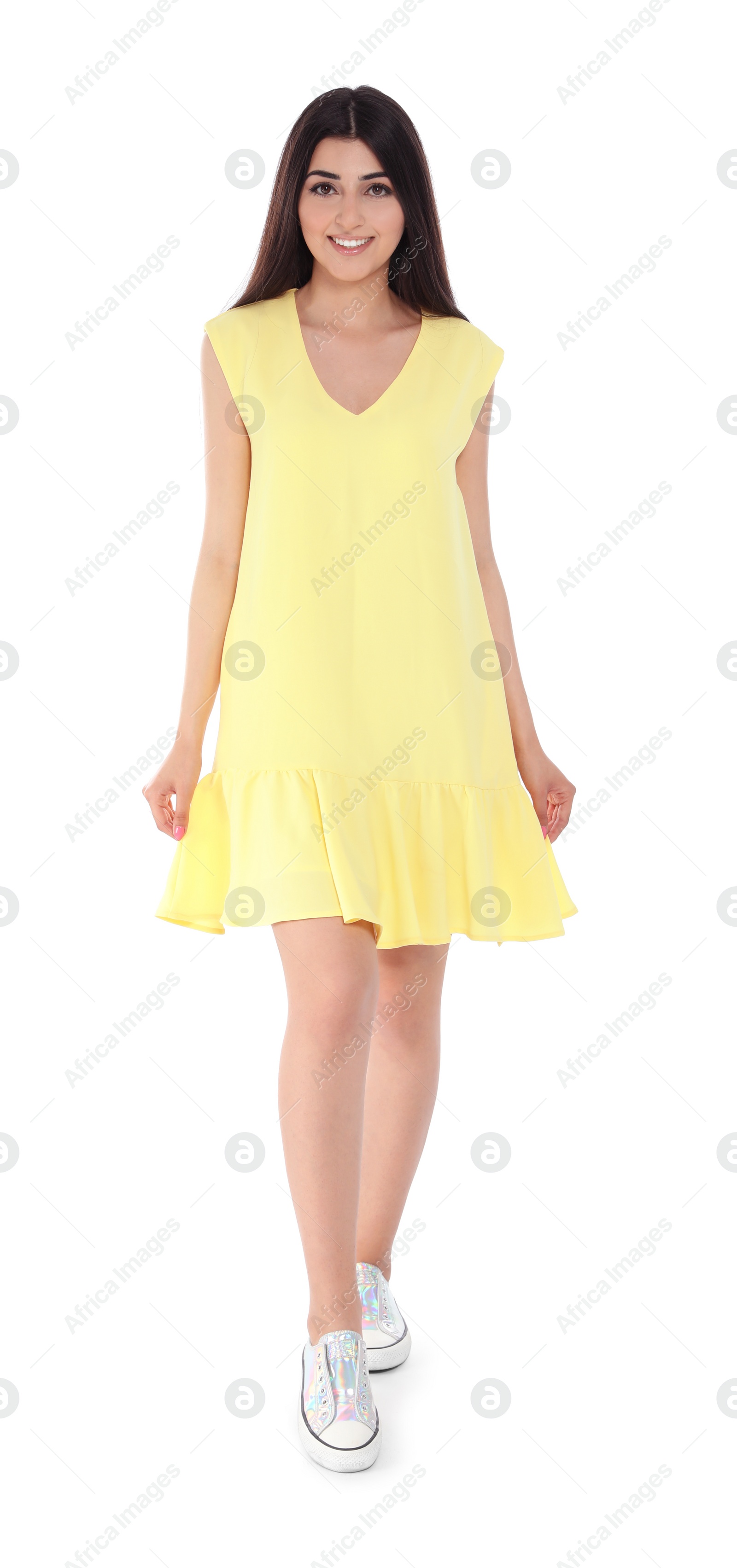 Photo of Full length portrait of brunette woman on white background