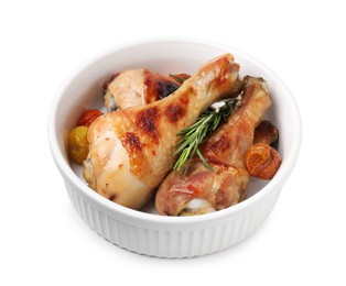 Delicious roasted chicken drumsticks with rosemary and tomatoes in bowl isolated on white