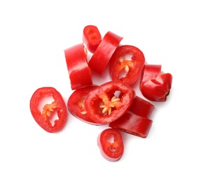 Photo of Pile of cut red hot chili peppers on white background, top view