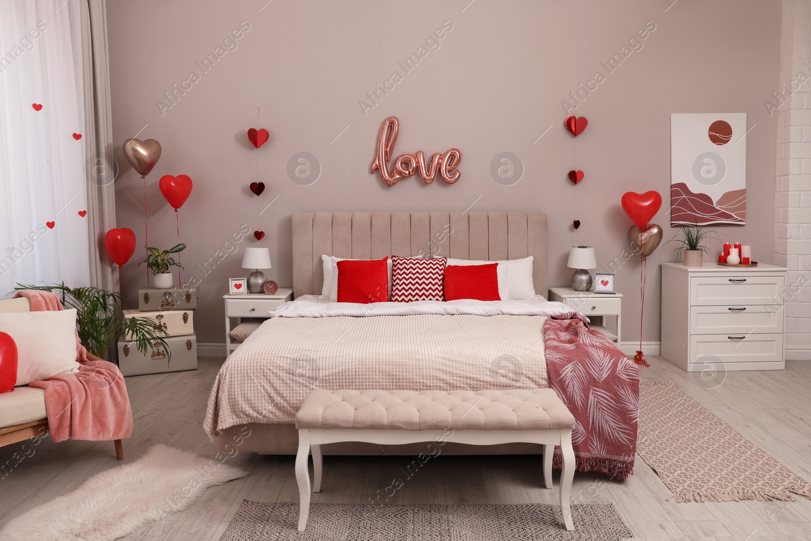 Photo of Cozy bedroom decorated for Valentine Day. Interior design