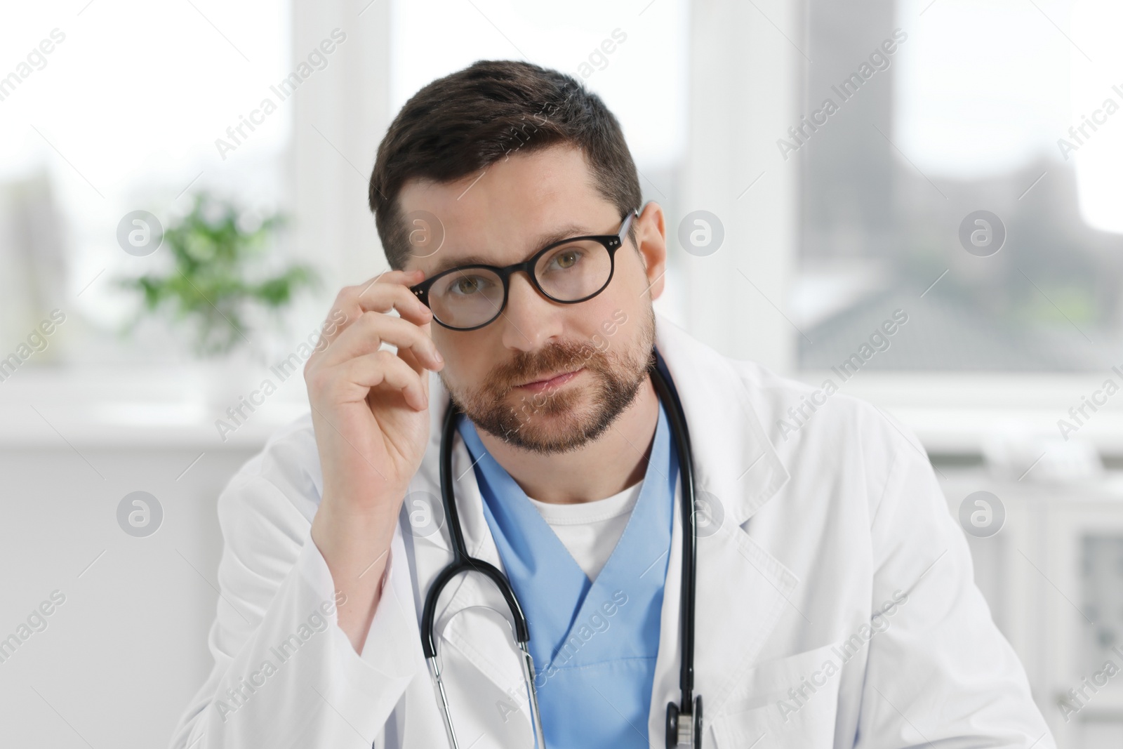 Photo of Portrait of doctor with stethoscope in clinic