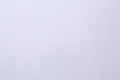 Photo of Texture of white paper sheet as background, top view