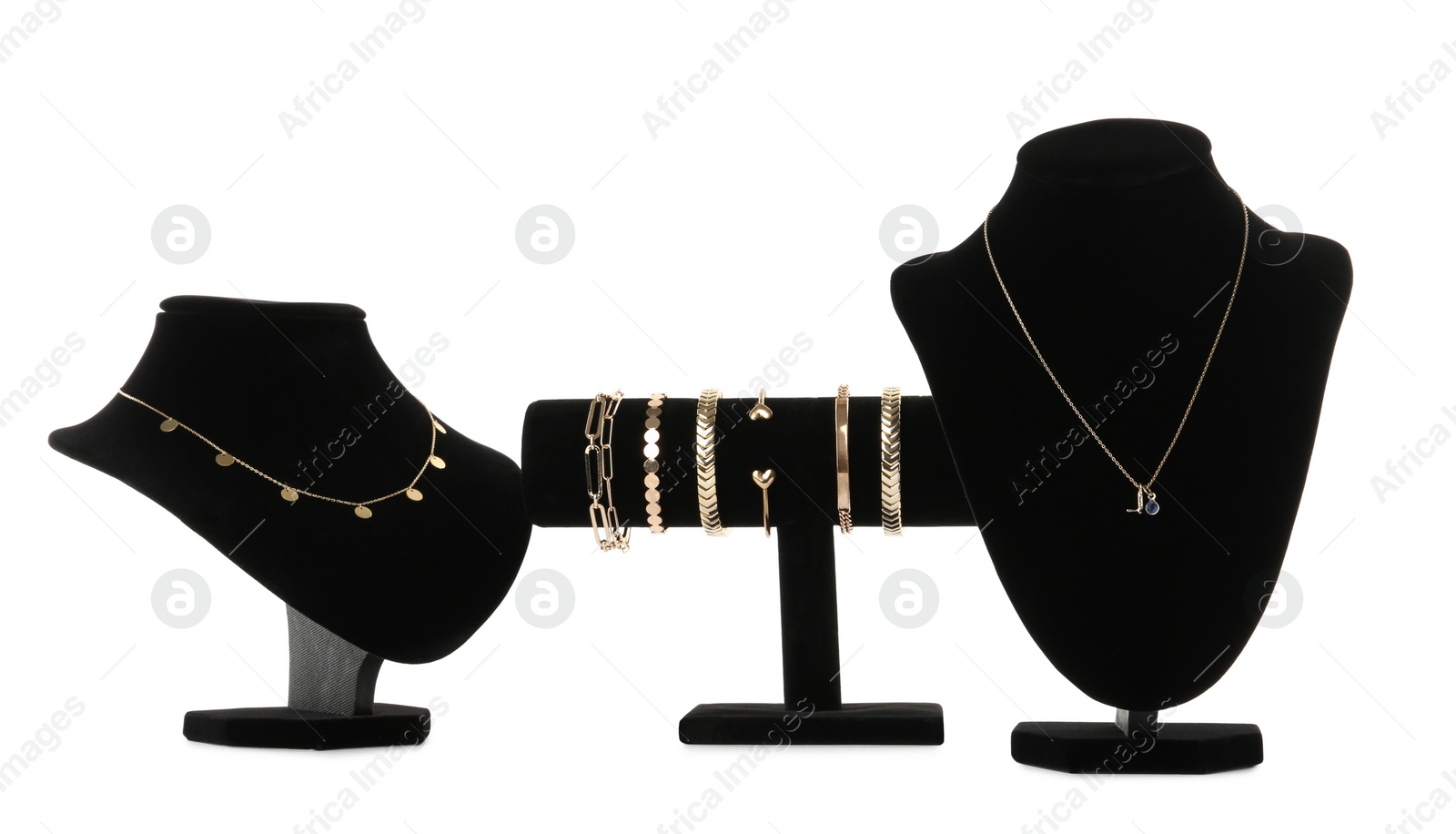 Photo of Different display stands with stylish jewelry on white background