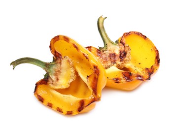 Halves of grilled yellow bell pepper isolated on white