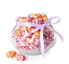 Sweet candies in glass jar on white background