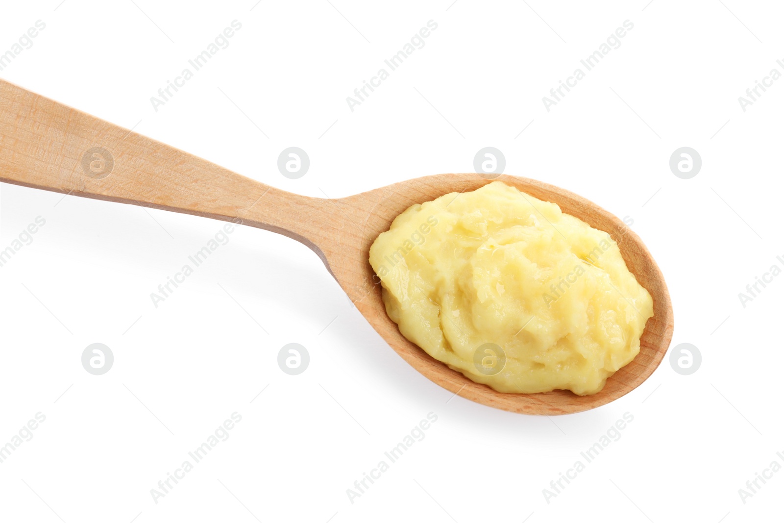 Photo of Wooden spoon of tasty mashed potatoes isolated on white, top view