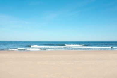Photo of Picturesque view of beautiful sea and sandy beach on sunny day