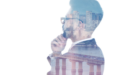 Image of Double exposure of businessman and city landscape