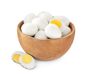 Hard boiled quail eggs in bowl on white background