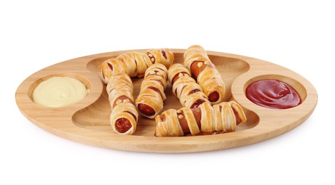 Photo of Cute sausage mummies served with sauce isolated on white. Halloween party food