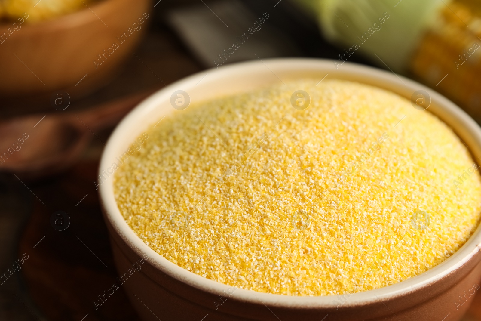 Photo of Pile of cornmeal in bowl, closeup view