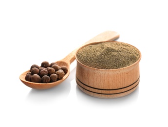 Photo of Spoon with pepper grains and bowl of powder on white background