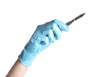 Photo of Doctor in medical glove holding surgical scalpel on white background