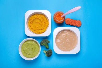 Photo of Flat lay composition with healthy baby food and ingredients on light blue background