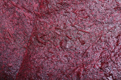 Photo of Delicious fruit leather as background, closeup view