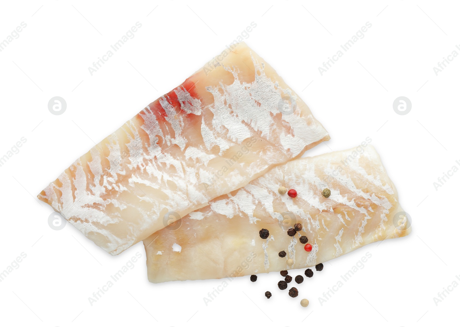 Photo of Fresh raw cod fillets with peppercorns isolated on white, top view