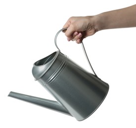 Photo of Woman holding watering can on white background, closeup