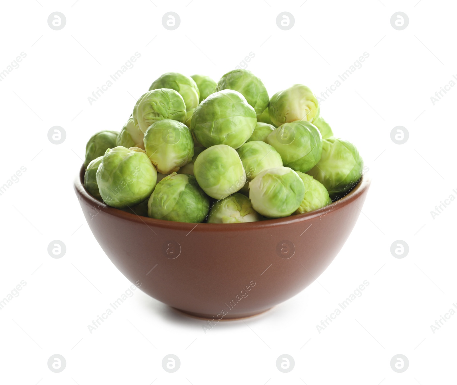 Photo of Bowl of fresh Brussels sprouts isolated on white