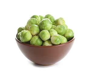 Photo of Bowl of fresh Brussels sprouts isolated on white