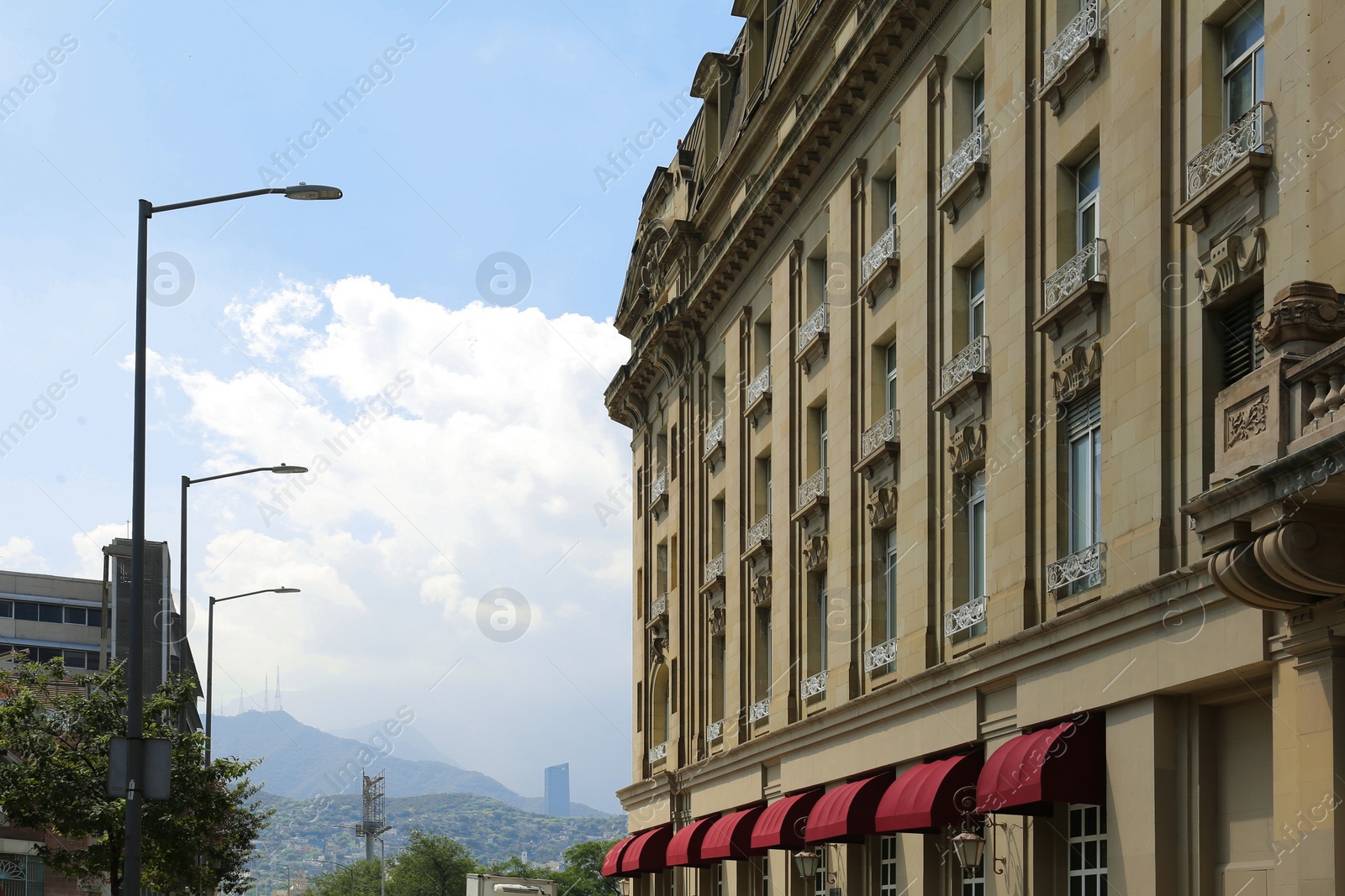 Photo of Beautiful view of city with modern building in mountains