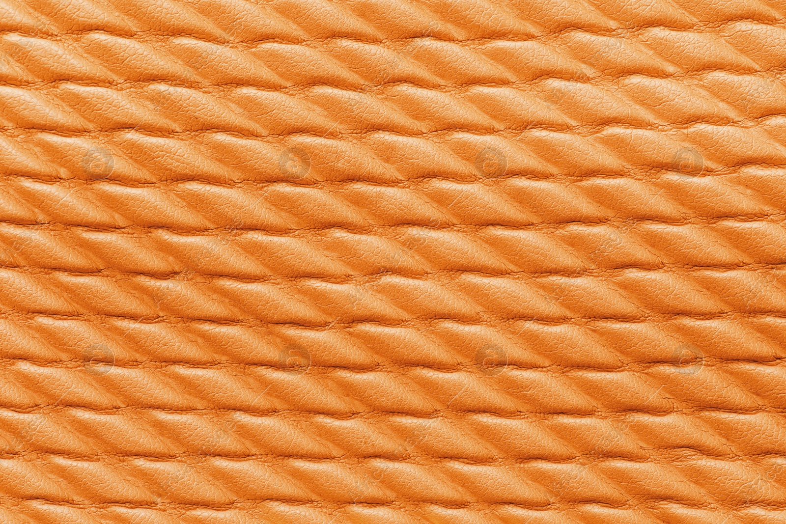 Image of Texture of orange leather as background, closeup