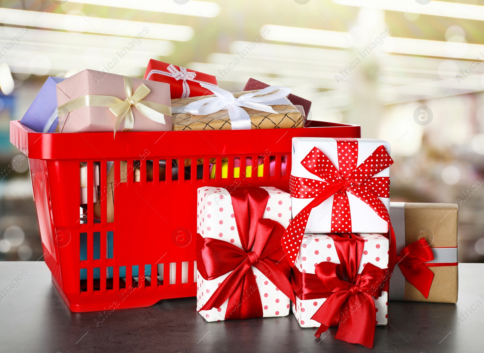 Image of Boxing day concept. Shopping basket with gifts in supermarket