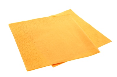 Photo of Yellow clean paper tissues on white background