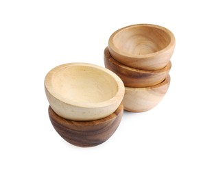 Set of wooden bowls on white background