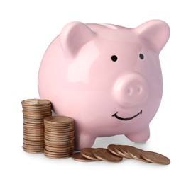 Photo of Piggy bank and coins on white background
