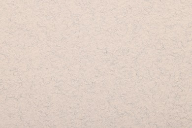 Photo of Texture of beige paper sheet as background, top view