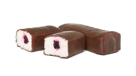 Photo of Cut and whole glazed curds with berry filling isolated on white