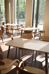 Photo of Modern cafe with stylish furniture. Interior design