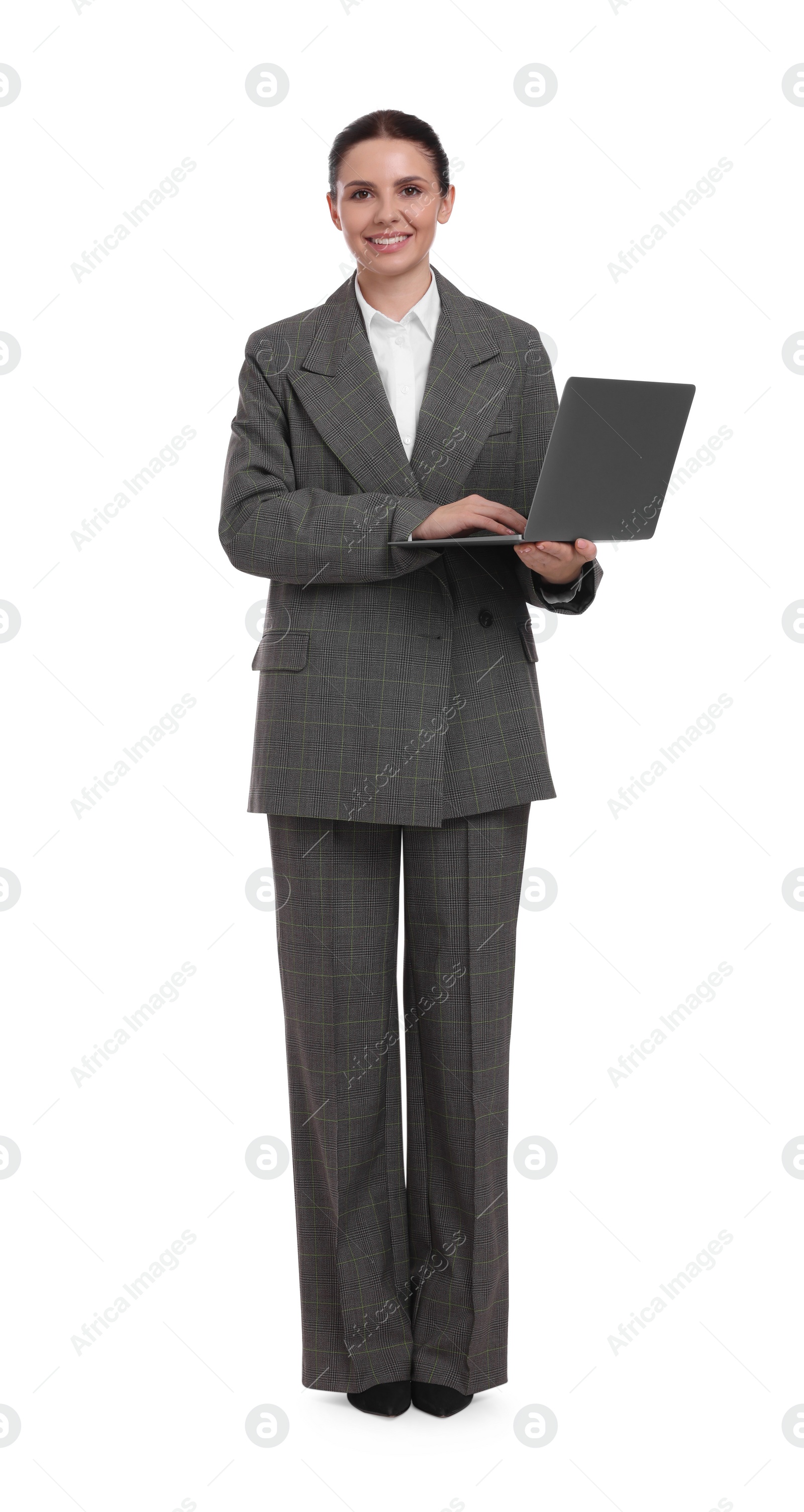 Beautiful businesswoman using laptop on white background Photo of Beautiful businesswoman using laptop on white background