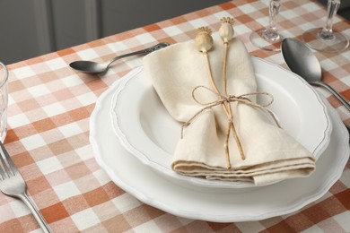 Photo of Stylish setting with cutlery and plates on table
